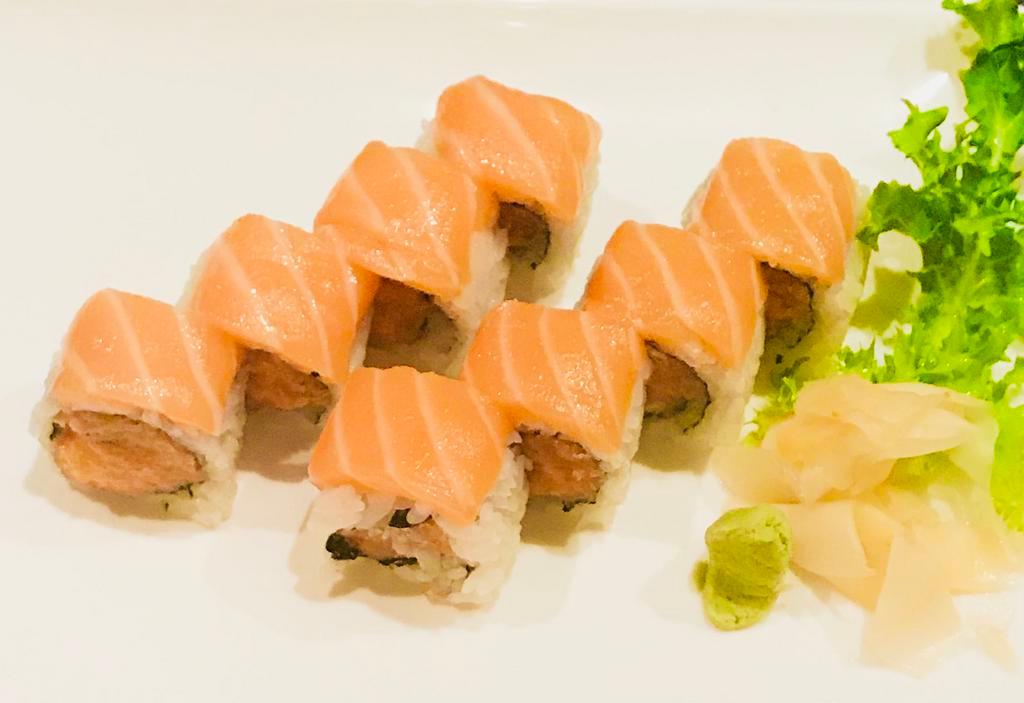 77. Salmon Lover Roll · Spicy salmon crunch inside with salmon on top.