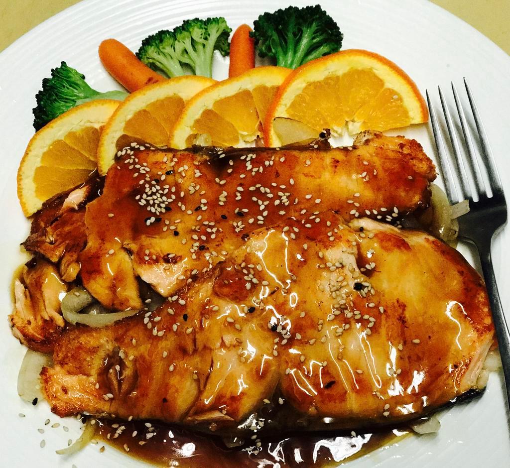 134. Salmon Teriyaki · Grill dish served in teriyaki sauce and with onion. Served with choice of side and rice.