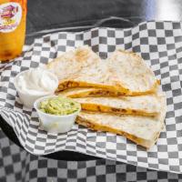 Quesadillas · Flour tortilla, Jack cheese and choice of meat served with a side of sour cream and guacamole.