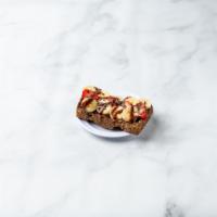 Nutella Toast · Nutella, banana, strawberry, bee pollen, cacao nibs, and chocolate agave drizzle.