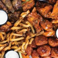 100 Piece Family Pack · 100 Pit-Smoked Bone-In or Traditional Boneless Wings with choice of up to 5 sauces, 4 large ...