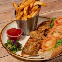 Po' Boy Sandwich · Served on toasted french bread with lettuce, tomato, and remoulade sauce. Served with french...