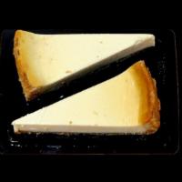 New York Style Cheesecake · A classic baked cheesecake made with rich cream cheese on a graham crust. 2 slices packed.