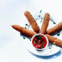 Mozzarella sticks · Served with marinara sauce