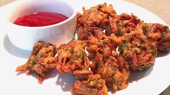 Onion Pakora · Fresh julienne cut onions mixed in a spiced batter and deep fried, with hints of curry leave...