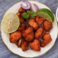 Chicken Pakora · Chicken dipped in spiced batter and deep fried.