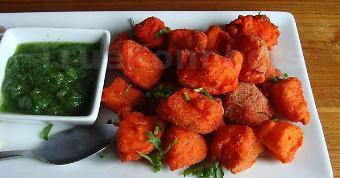 Fish Pakora · Chunky fish marinated in lime juice, ginger and garlic, coated in a spiced gram flour batter...
