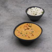 Chicken Tikka Masala · Chicken tikka simmered in a sauce made with onions, tomatoes and cream.