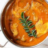 Fish Pulusu · Fish fillets simmered in onion, tomato, tamarind gravy, fenugreek seeds, curry leaves and ex...