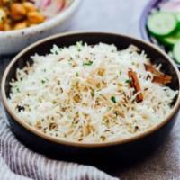 Jeera Rice · Cooked basmati rice tossed with ghee and cumin seeds.