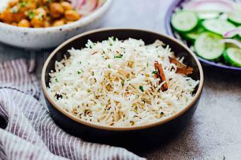Jeera Rice · Cooked basmati rice tossed with ghee and cumin seeds.