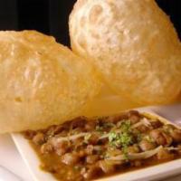 Chole Bhatura · Deep fried all-purpose flour bread served with chickpea curry
