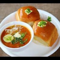 Pav Bhaji · Spicy mixed potato and vegetable curry served with pav (indian bread) on the side.