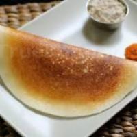 Plain Dosa · Thin crepe made with fermented rice and lentil batter.