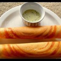 Ghee Dosa · Dosa roasted with Indian butter. Thin crepe made with fermented rice and lentil batter.