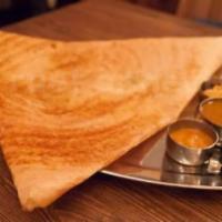 Mysore Masala Dosa · Spicy sauce smeared dosa filled with mildly spiced mashed potatoes and onions. Thin crepe ma...