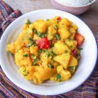 Aloo Gobi · Delightful steamed potatoes and cauliflower cooked with fresh onions, tomatoes and spices.