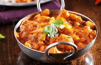 Vegetable Vindaloo · Fresh vegetables and potatoes simmered in a delicious blend of red chilies, ginger, garlic and spices.