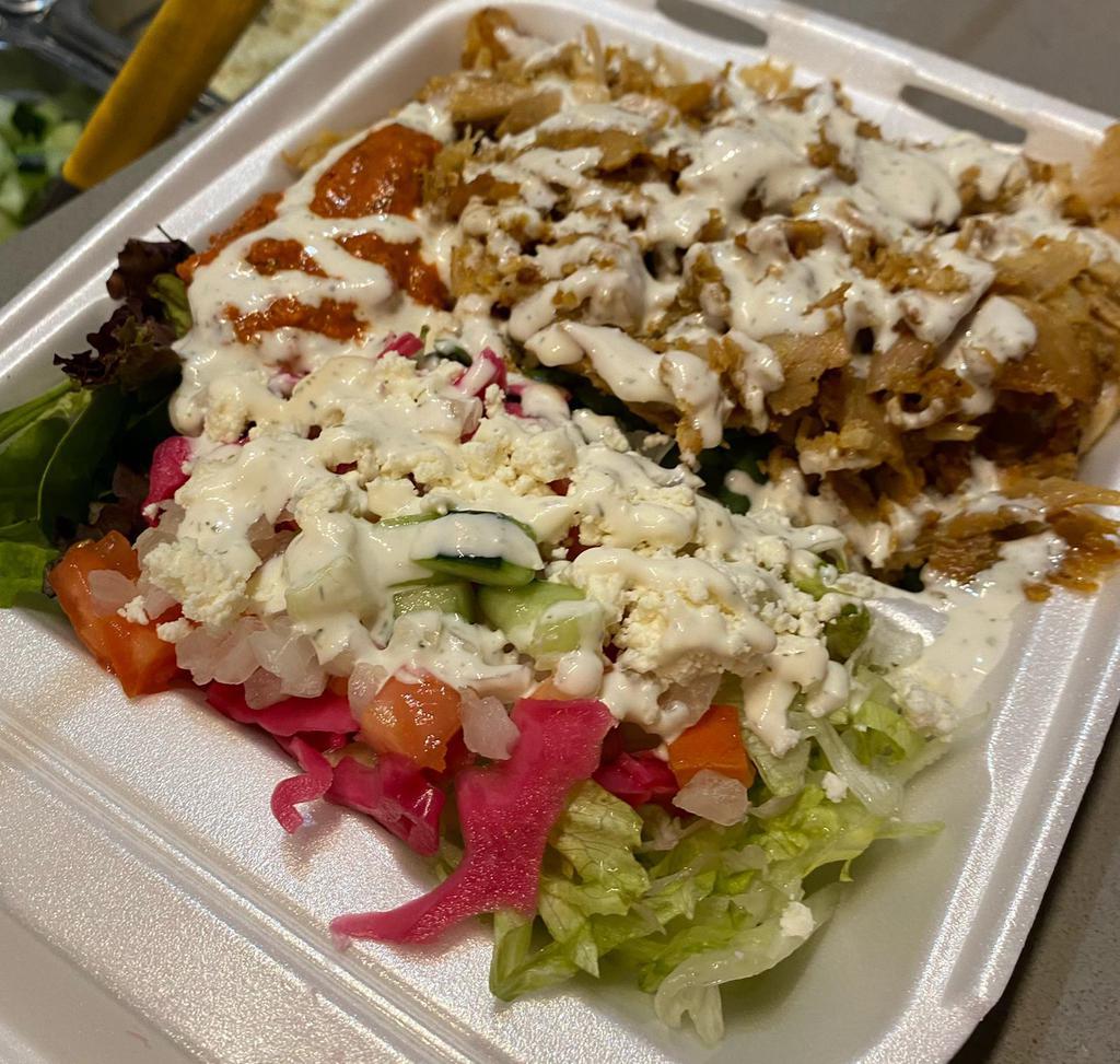 Doner Kebab Platter Combo Deal · A Beef/Lamb Mix or Chicken dish with Fried/Steam Rice or French Fries. Fresh Toppings of your choice and sauce. Served with Can Soda