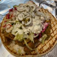 Gyro Combo Deal · A Beef/Lamb Mix or Chicken Gyro. Wrapped in a Greek Pita Bread with Fresh Toppings of your C...