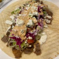 Doner Wrap Combo Deal · A Beef/Lamb Mix or Chicken Wrap. Rolled in a Tortilla Wrap with Fresh Toppings of your Choic...