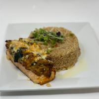 Stuffed salmon  · Norwegian salmon stuffed with shrimp and crab meat served with rice. 
