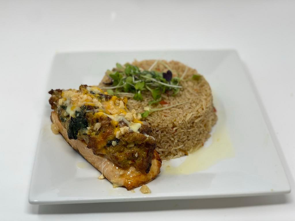 Stuffed salmon  · Norwegian salmon stuffed with shrimp and crab meat served with rice. 