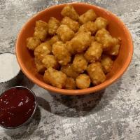 Tater Tots · A basket full of crispy tots for kids at heart.