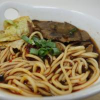 Beef Noodle Soup 牛汤 · Braised beef and veggie in Beef Broth with Chinese spices.  Little spicy.