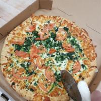 Mediterranean Pizza · Pizza cheese, sauce, feta cheese, black olives, broccoli, spinach, garlic, and oregano.