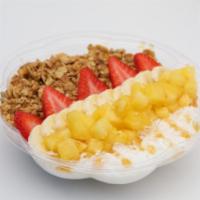 North Shore Coconut Bowls · Blended coconut topped with banana, strawberry, pineapple, coconut shavings, honey and grano...