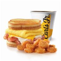 Ham Grilled Cheese Breakfast Sandwich Combo · Ham, American and Swiss cheeses, and folded egg on sourdough toast. Served with small drink ...