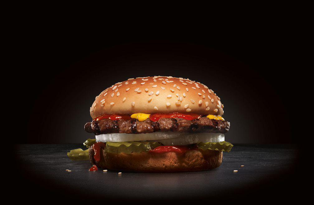 Big Hamburger · Charbroiled All-Beef Patty, Dill Pickles, Onions, Mustard and Ketchup on a sesame seed bun.