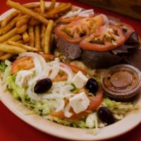 Gyros Dinner with Pita Bread · Our authentic Gyros meat on a hot pita bread, topped with onions, tomato, and tzatziki sauce...
