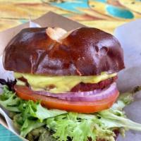 Aguacate Burger · Our Signature Burger Patty made of Sprouted Lentils, Mung and Adzuki Beans, Quinoa, Beets, F...