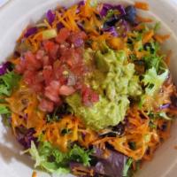 House Salad · Mixed greens, avocado, red onions, cucumbers, red peppers, tomatoes, shredded carrots, tosse...