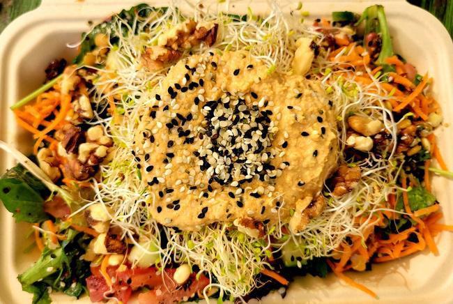 Nuts for Salad · Fresh kale and mixed baby greens, walnuts, sprouted beans, lentils, alfalfa sprouts, diced tomatoes and cucumbers, and topped with a scoop of hummus and poppy seed dressing.