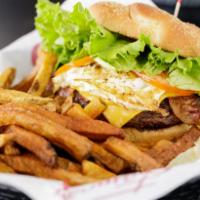 Sam's  Burger ·  Juicy 1/2 Pound burger served with green leaf lettuce and tomato and raw onions. Served wit...