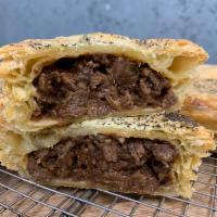 Steak Pie · Slow-braised shredded steak in gravy, flavored with fresh thyme in a delicious puff pastry.