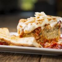 Lasagna Pasta · Homemade from the family recipe: layers of ribbon noodles and 3 cheeses, smothered in marina...