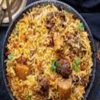 Goat Biryani · Basmati rice and goat meat, flavored with saffron and cooked on low heat
