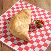 Cheese Calzone · Seasoned ricotta and mozzarella cheese baked inside our crispy dough pocket and served with ...