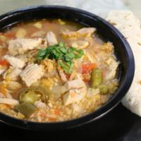 Soups · Caldo de pollo. Served with rice, queso, Tortilla, cilantro.