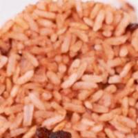 Coconut Rice · Rice cooked in coconut milk with kidney beans.