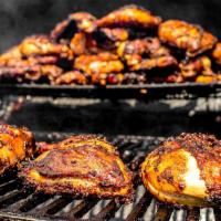 Jerk chicken · Dark meat chicken marinated in authentic jerk seasoning and grilled to perfection