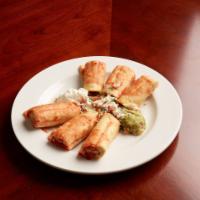 Taquitos Rancheros · Deep fried rolled corn or flour tortillas, stuffed with chicken or shredded beef, garnished ...