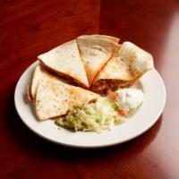 Quesadilla · Large flour tortilla with cheddar cheese and your choice of chicken or beef, chorizo (Mexica...
