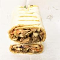 Beef Shawarma · Nigerian style shawarma near you.

Diced beef nestled with some cabbage mix and some ketchup...