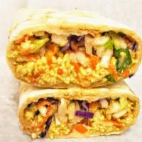 Tofu Shawarma · Seasoned tofu nestled with some cabbage mix and some ketchup mix tightly rolled in flour tor...