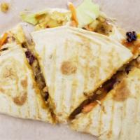 Beef & Chicken Quesadilla · Diced beef and chicken nestled with some cabbage mix and some ketchup/mayo mix on a bed of s...